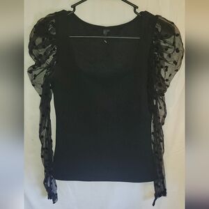 Elegant Black Top with Sheer Polka Dot Sleeves